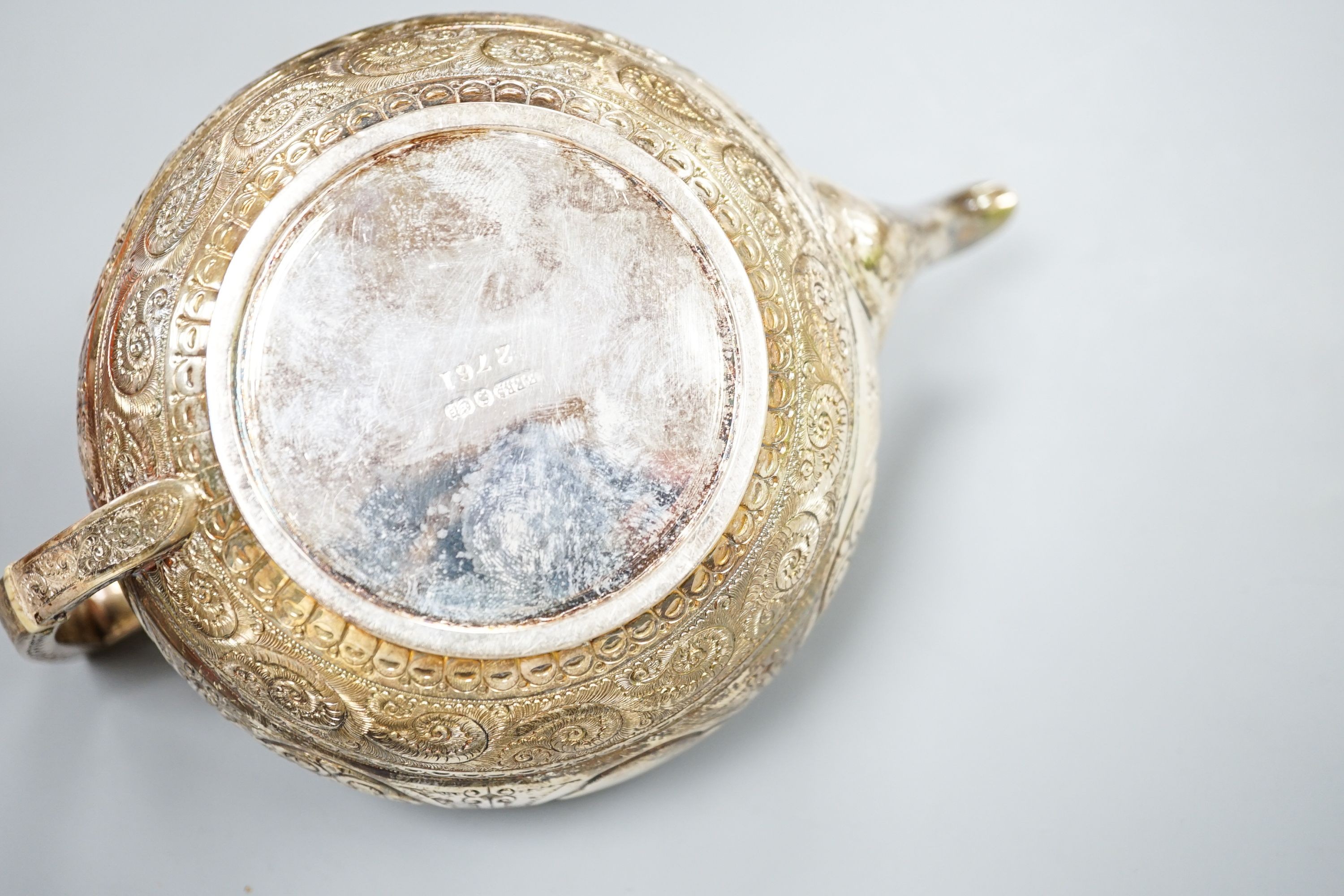 A WMF dish, Islamic white metal mounted photo album and a plated teapot and jug